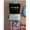 Image 2 : NINTENDO DS LITE WORKING WITH CHARGER AND 5 GAMES 3 WITH CASES
