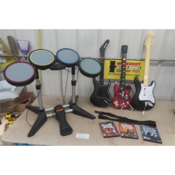 3 Guitar Hero Guitars and Drum Set 