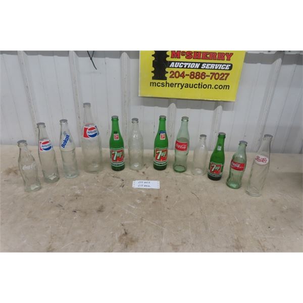 12 Assorted Pop Bottles - Coke, Pepsi, 7UP Plus More 