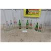 Image 1 : 12 Assorted Pop Bottles - Coke, Pepsi, 7UP Plus More 