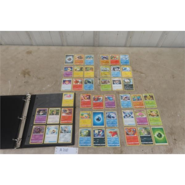 Lot of 60 Pokeman Cards in Binder
