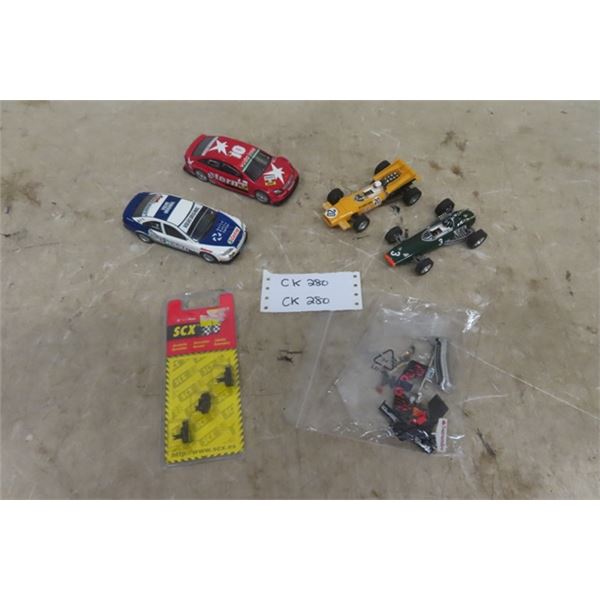 4 SCX Slot Cars ; Chevrolet, Toyota, McLaren, Brm - Extra Brushes + Parts