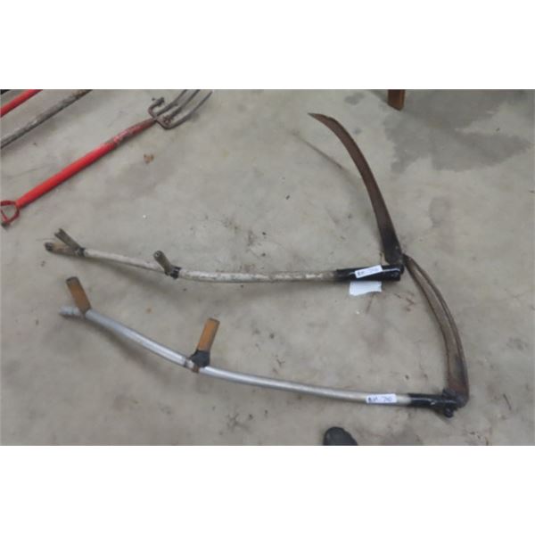 2 Scythes; 1) Wooden Handle, 1) Aluminum Handle