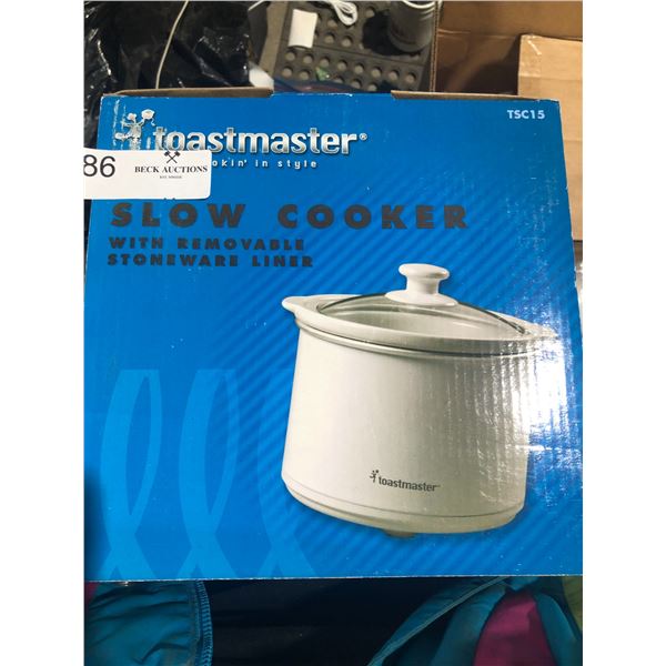 Assorted Cook Books And Slow Cooker