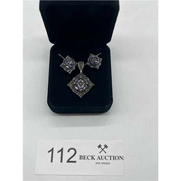 Silver pendant and earring set