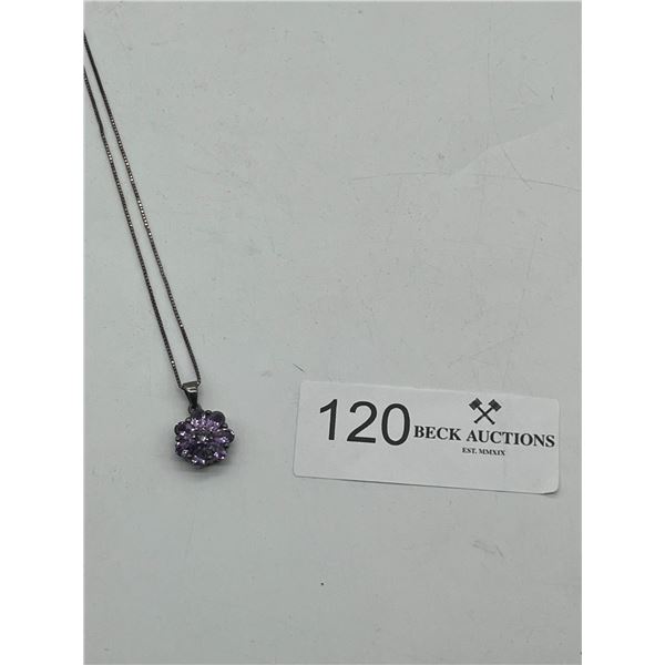 Silver necklace with purple gemstones