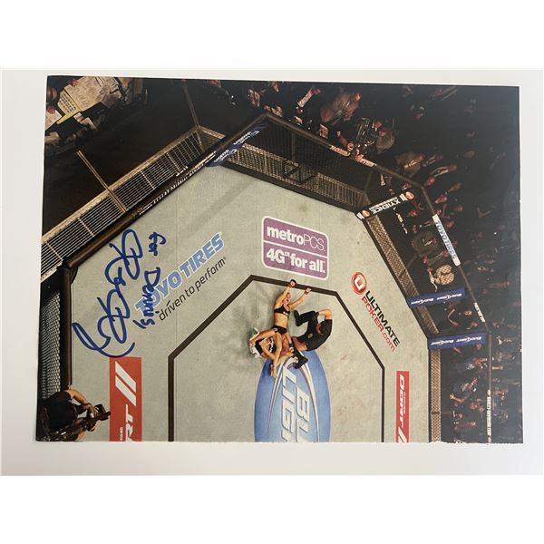 Professional wrestler Ronda Rousey signed magazine page