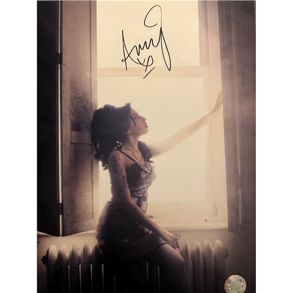 Amy Winehouse signed photo. GFA authenticated