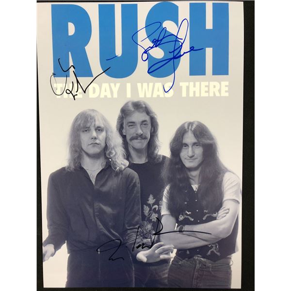 RUSH GROUP SIGNED 8X10 PHOTO (RA COA)