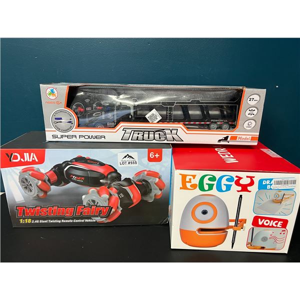 Lot of 3 Assorted Kids Toys - Toy Truck, Stunt Car, and Eggy Drawing Tool