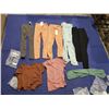 Image 1 : LOT OF NEW SPANDEX CLOTHES, PANTS, SHIRTS ETC