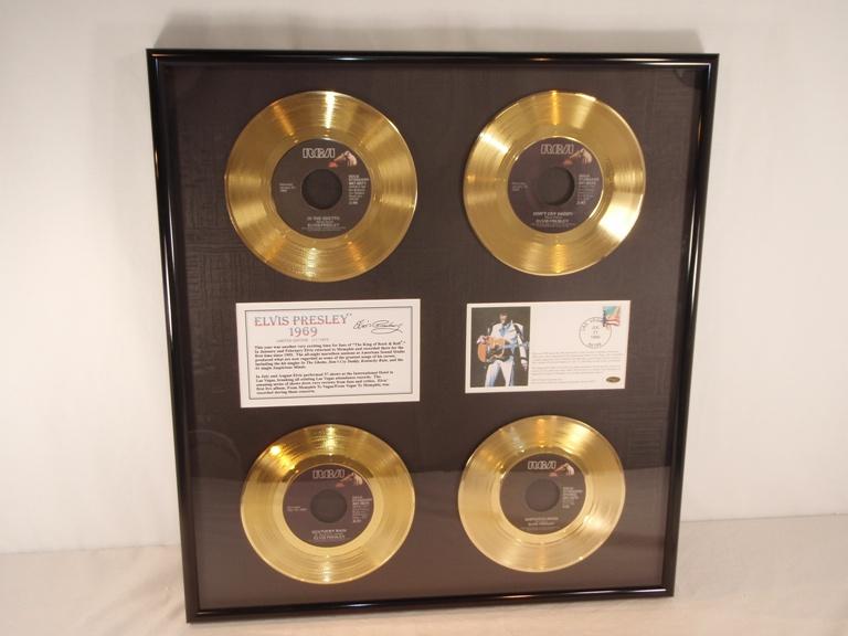 Framed Elvis Presley 1969 Framed set of 4 gold plated 45 records