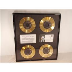 Framed Elvis Presley 1969 - Framed set of 4 gold plated 45 records ...