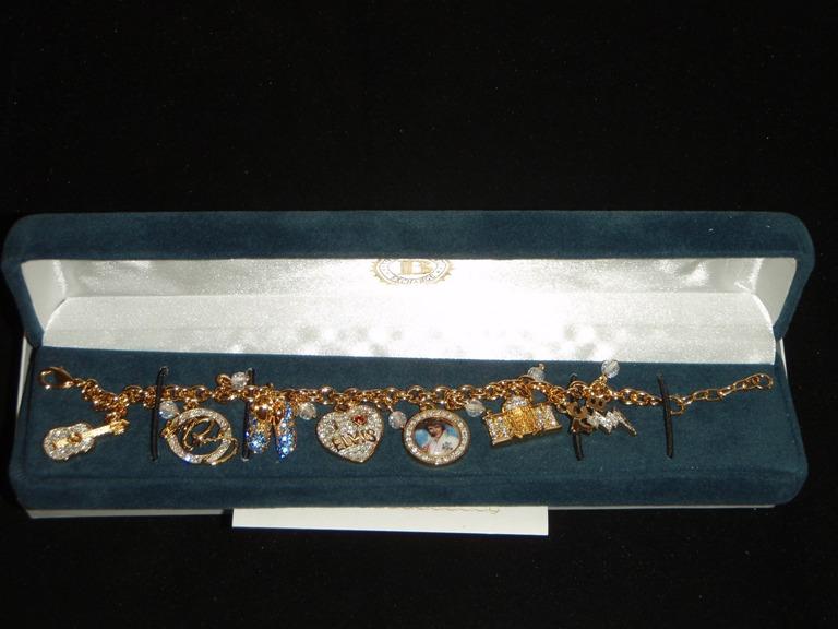 Elvis Bradford Exchange Charm bracelet Gold w/ crystals and 7 charms