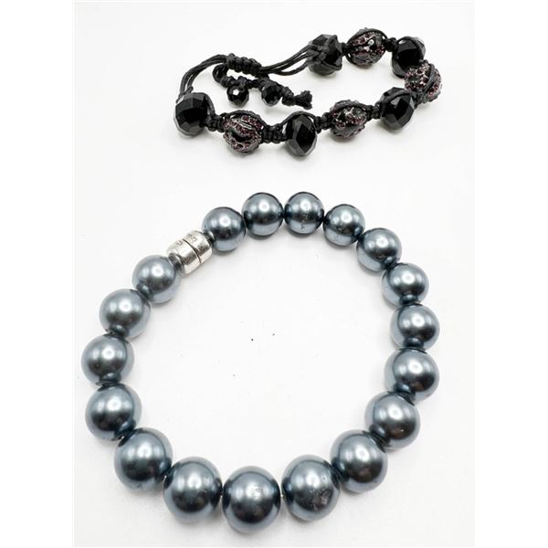 2 BRACELETS- (1- MARKED)
