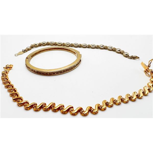 3 GOLD TONE BRACELETS (1- ROMAN)