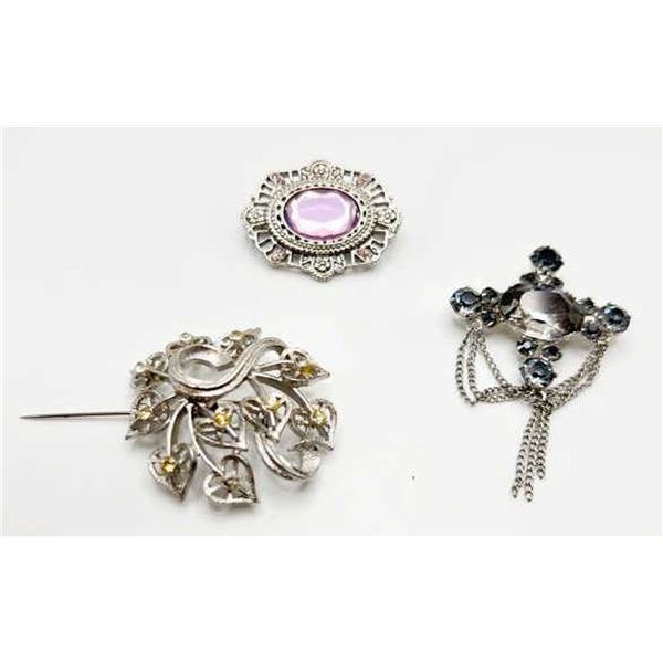 3 BROOCHES (1-AMETHYST COLOR, 1 DARK