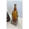 Image 2 : 2 LARGE VINTAGE LIQOUR BOTTLES AND HOLDERS