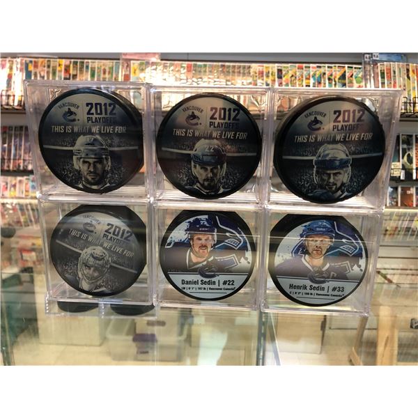 VANCOUVER CANUCKS HOCKEY PUCKS LOT