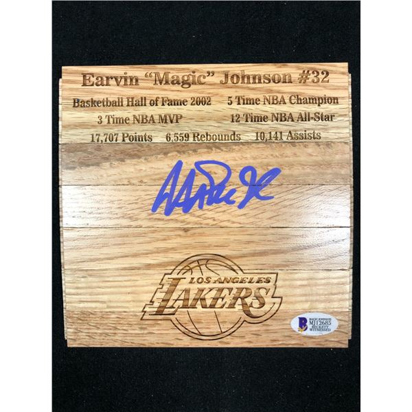 MAGIC JOHNSON SIGNED AUTHENTIC FLOOR PIECE WITH CAREER STATS (BECKETT COA)