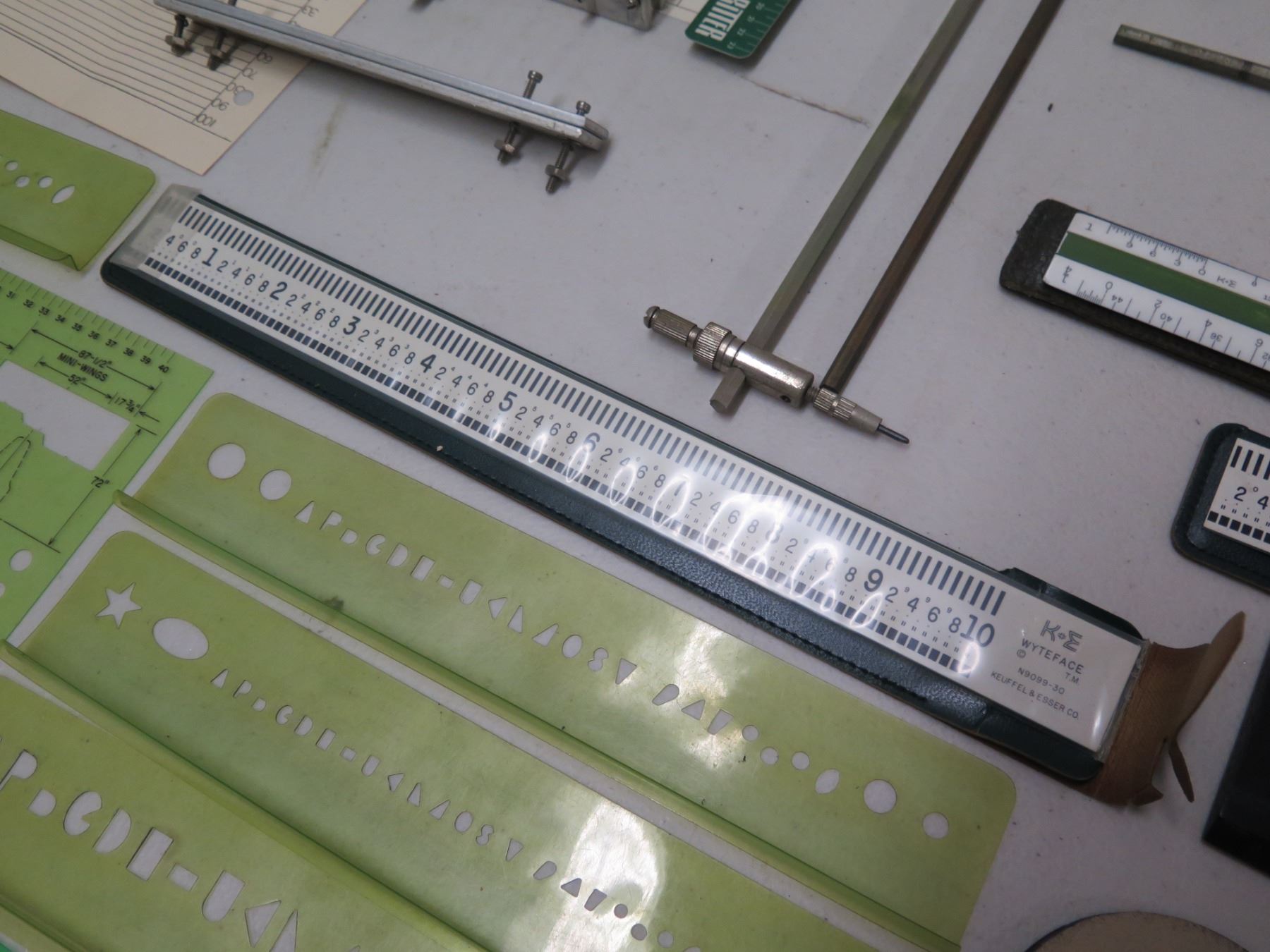 Multiple Rulers Multiple Rulers, T-Squares, Stencils, Conversion Chart, Pencils, etc ...