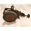 Image 3 : Two antique grinders, vices on table