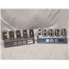 Image 1 : Pair of Fargo 200 metal emblems
