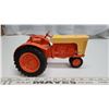 Image 1 : Orange metal tractor collectors toy, tire is crooked.