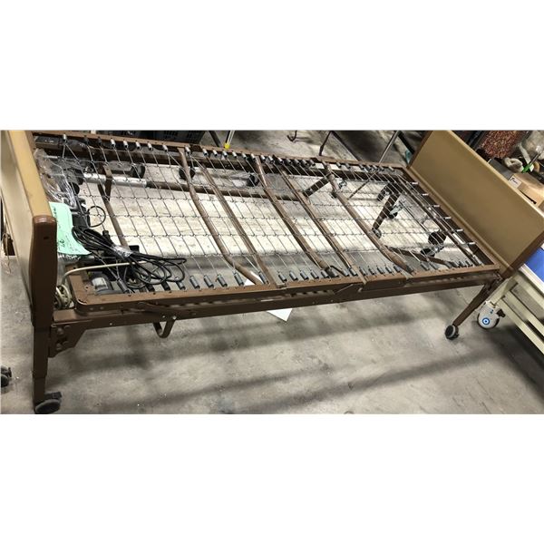 Invacare homecare bed w/ hydraulic (approx 87" long x 35" length x 32" height)