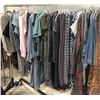 Image 1 : Rack of assorted wardrobe - includes dresses / jean jackets / sweatpants / sleeping robes / shirts /