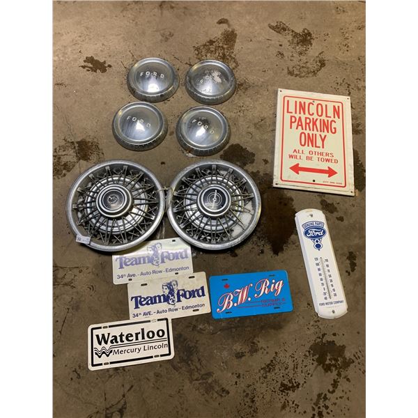 Assortment of Ford Memorabilia - Hub Caps, License Plates, Thermometer, and More!