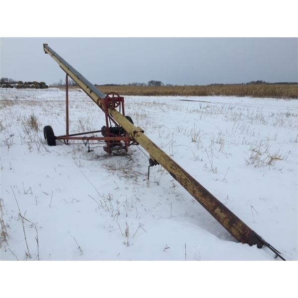 Old grain auger with gas engine