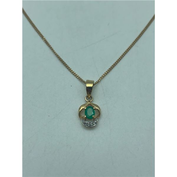 14Kt oval emerald pendant/chain 30pt emerald - Suggested retail $1400-1800