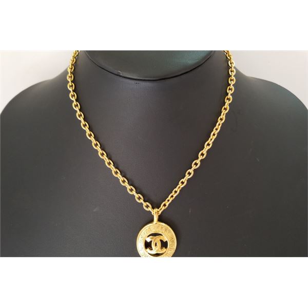 Chanel Gold-tone Metal CC Logo Sunburst Pendant Necklace