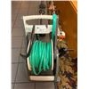 Image 1 : GARDEN HOSE AND ROLLER