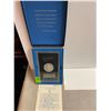 Image 1 : 1884 cc Uncirculated Silver Dollar in a box.