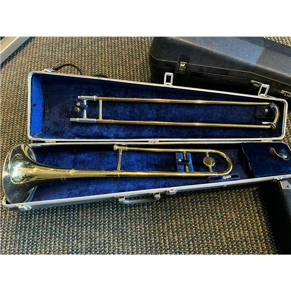 GETZEN CARAVELLE SLIDE TROMBONE WITH A HARD CASE - USED SOME SCRATCHES