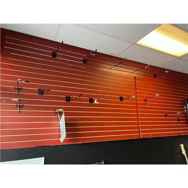 APPROX 14 SLOT WALL GUITAR/INSTRUMENT HOLDERS