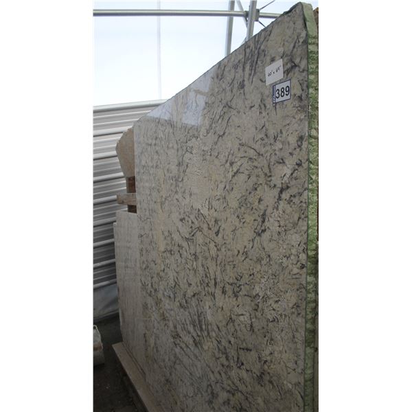 1- Slab, Approx. 60" x 69" x 1 1/4" thick, Persia pearl Granite. No slabs to be loaded until  Feb 15