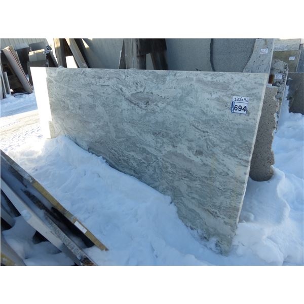 1- Slab, Approx. 122" x 42" x 1 1/4" thick, Fantasy brown honed Granite