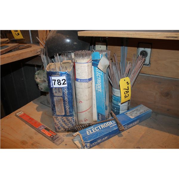 Qty of welding rods, helmet and chipping hammer