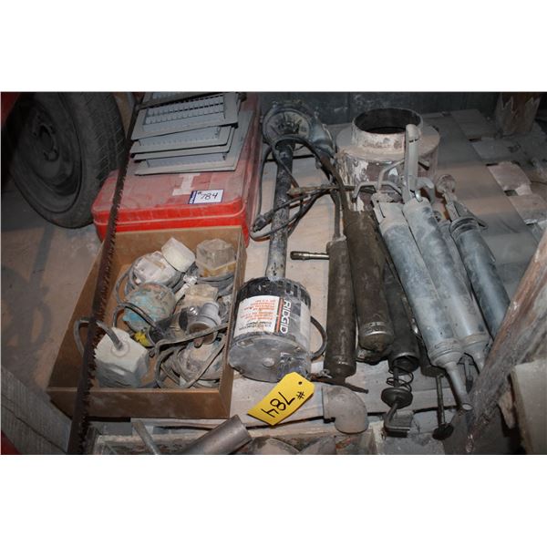 Sump pump, grease guns, saw, spare tire, empty Hilti case and misc. parts