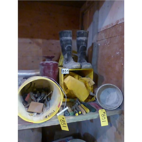 Rubber boots, wet gear, crates and knives