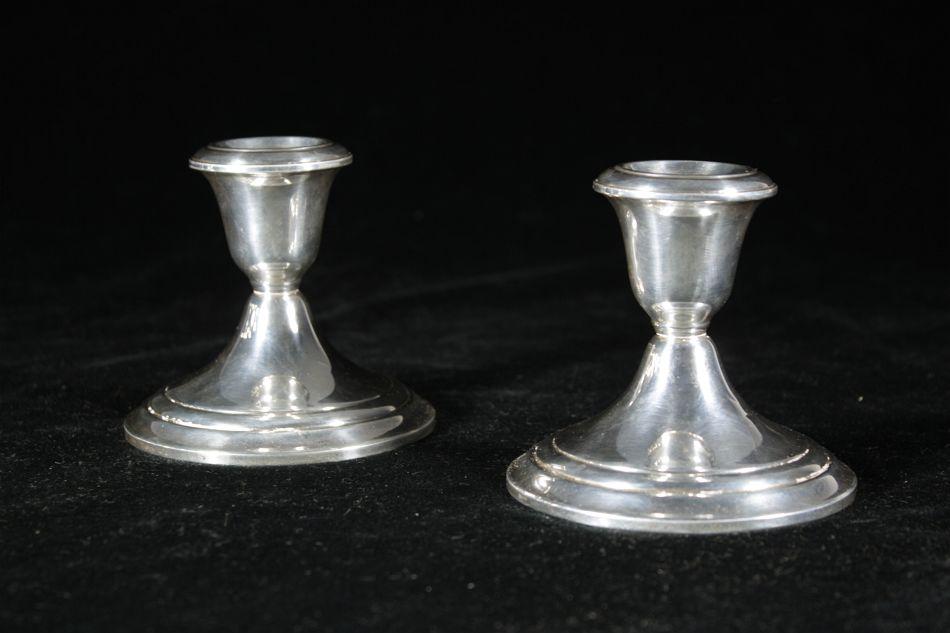 A Pair of Gorham Weighted Sterling Silver Candlesticks.