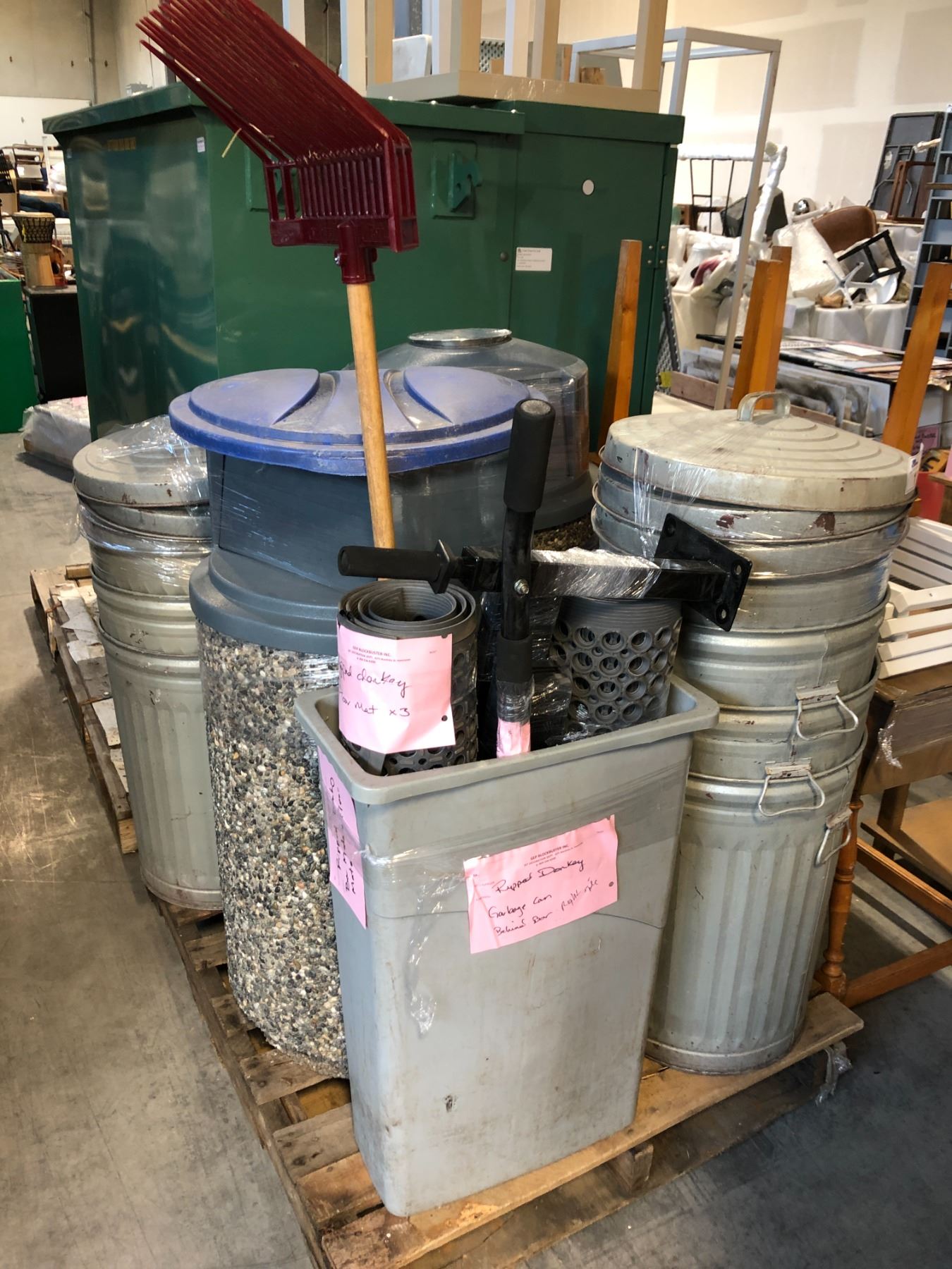 PALLET PROP LOT OF ASSORTED TRASH CANS, FIRE HYDRANT, AND RUBBER MATS