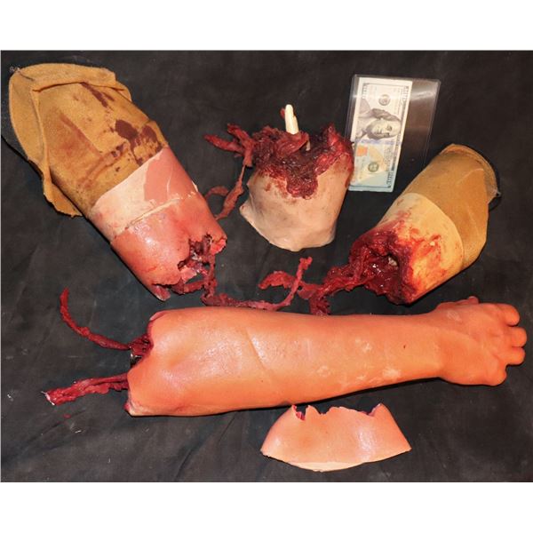 SEVERED SILICONE ARM WITH WITH GORE AND SEVERAL STUMPS