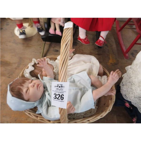 Sleeping Dolls In Basket