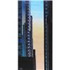 Image 1 : Sean Randall Canadian [b. 1965]CALGARY SKYLINE AT SUNSETacrylic on canvas48 x 24.5 in. (121.9 x 62.2
