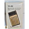 Image 1 : VINTAGE TI-30 CALCULATOR IN CASE WITH BOOKLETS