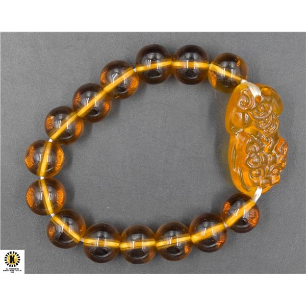 #130-YELLOW OBSIDIAN 12MM /8" BRACELET